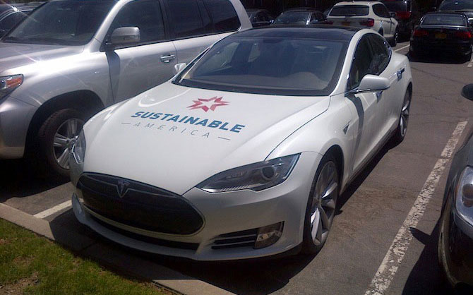 Sustainable America's Tesla has a solar panel on the roof that powers the car's electronics.